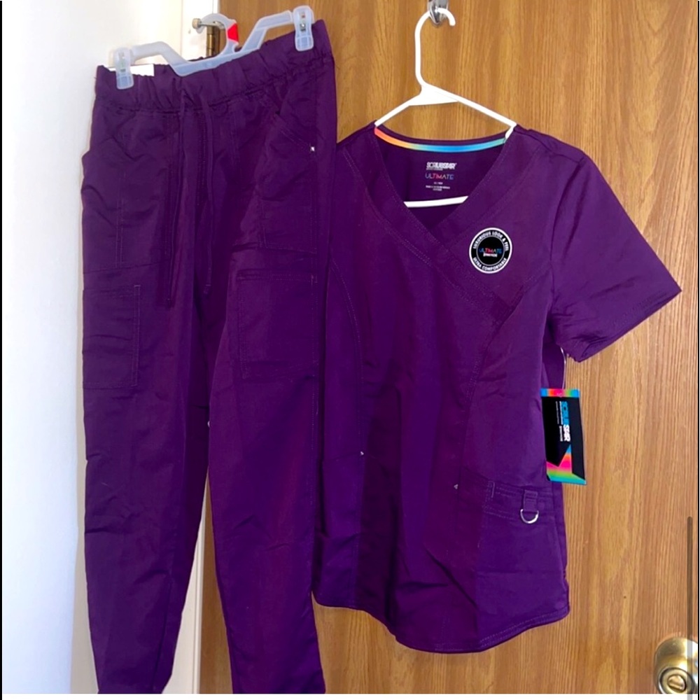 Brand new woman’s size XS scrub set with tags